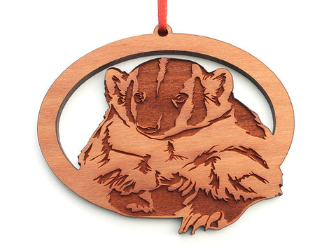 Badger Oval Ornament - Nestled Pines